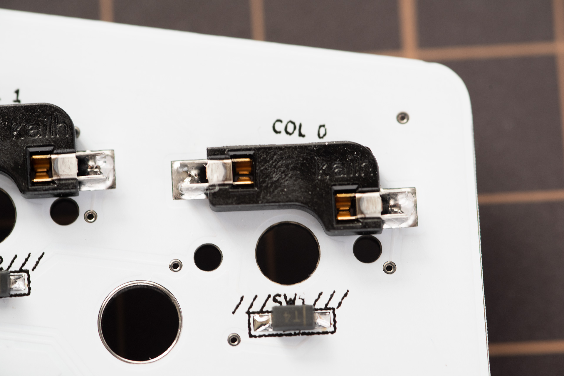 Hotswap switch sockets soldered to the back of the PCB